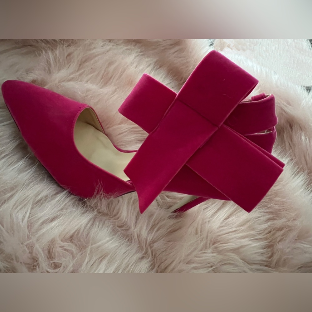 Hot pink soft pumps with a Velcro removable ankle strap with bow. MMJULY BRAND